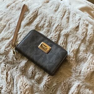 Michael Kors Black Wristlet with Gold Plaque